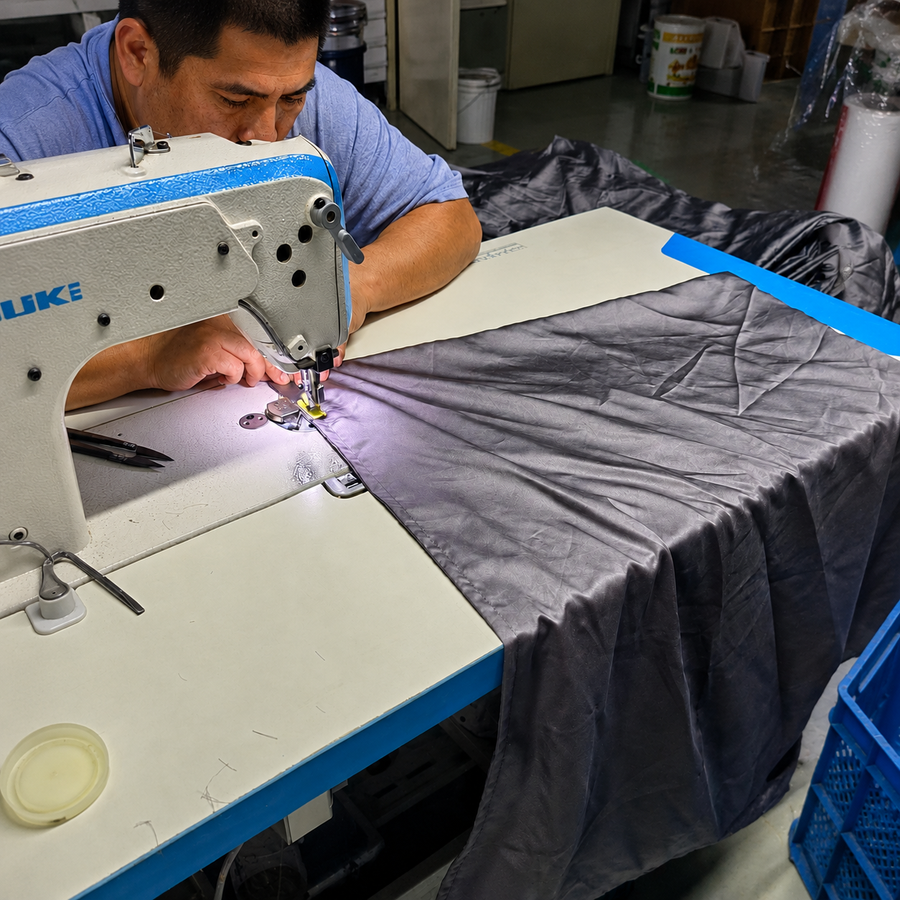 Hands touching soft Calora Sleep fabric