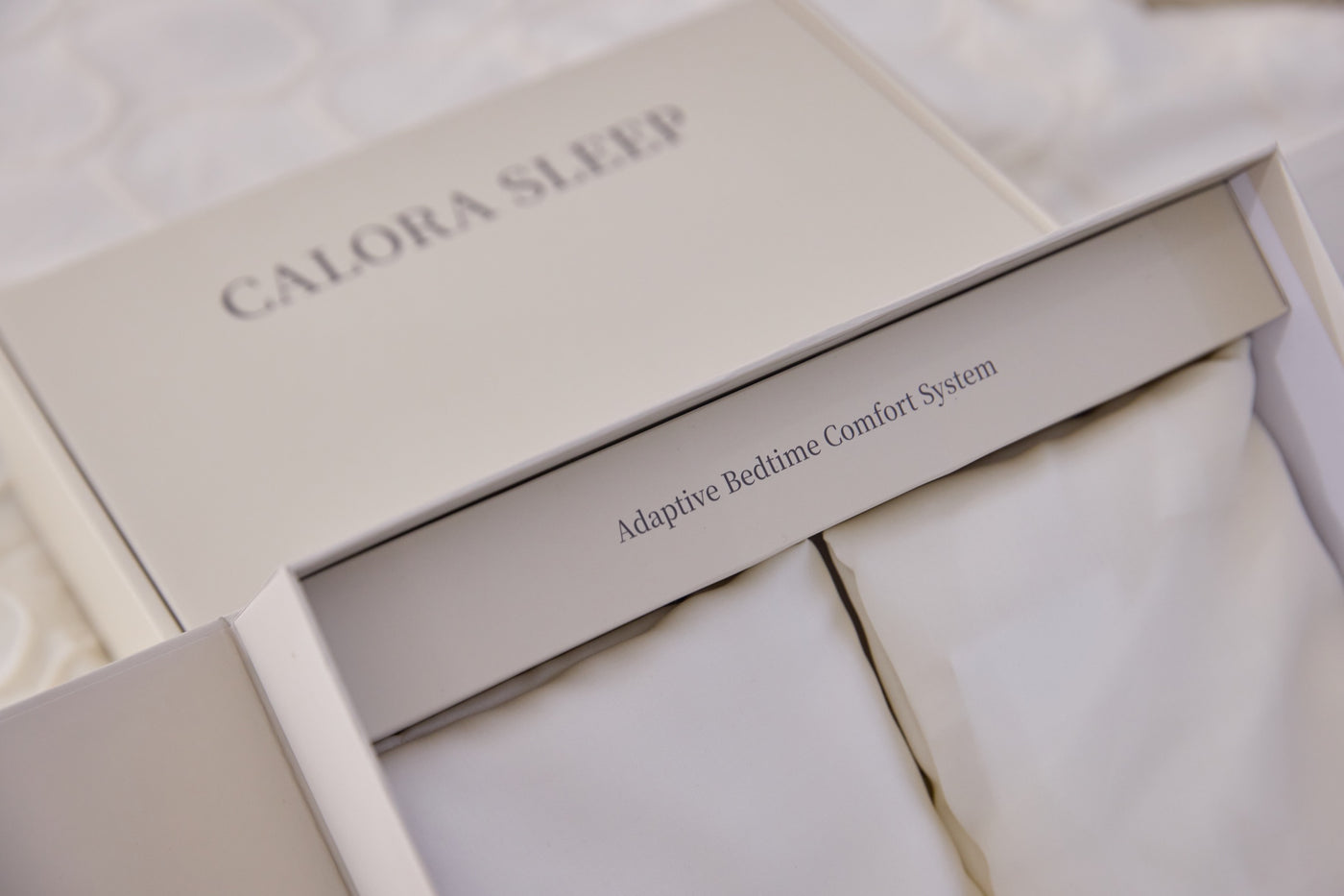 Open Calora Sleep premium gift box with two ivory pillowcases